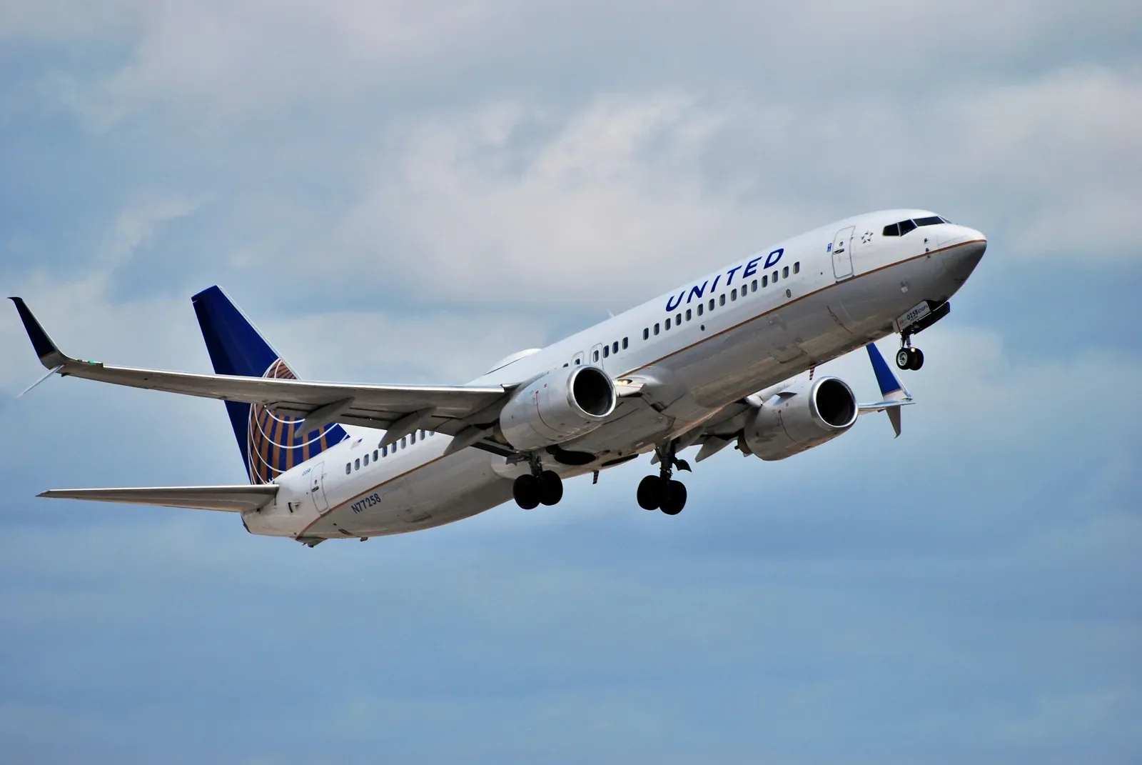 United Boeing 737 airliner climbing after takeoff